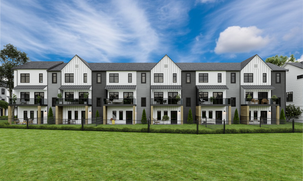 Exterior rear view of Kamira at Livingston townhomes showing durable Hardie Board siding and private fenced backyards with maintenance-free landscaping.